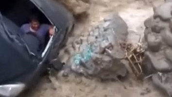 Driver Whose Car Was Swept Away By Flooding Waters Was Saved In The Craziest Of Ways
