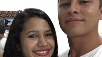 What’s Going On In The Background Of This Couple’s Selfie Is Totally Freaking The Internet Out