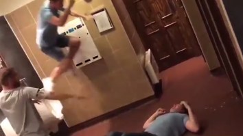 These Three Drunk Dudes Having A Pretend WWE Match In A Pub Bathroom Are #BroGoals
