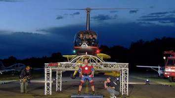 Strongman Attempts To Lift A Helicopter On His Shoulders, Because Why Hell Not?