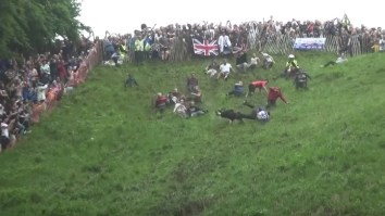 The 2017 Gloucester Cheese Roll Was A Total Mess Of Flailing Bodies And Flying Cheese Wheels
