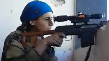 The Moment Fearless Kurdish Sniper Laughs Off ISIS Bullet Whizzing Inches From Her Head