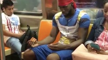 We’re All Living In 2017, This Man Doing A Rubik’s Cube One-Handed On The Subway Is Living In 3047