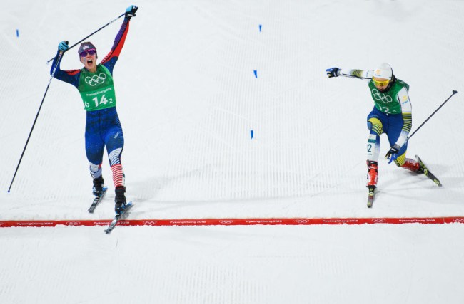 PYEONGCHANG-GUN, SOUTH KOREA - FEBRUARY 21:  Jessica Diggins of the United States (14-2) stretches across the finish line to win gold ahead of Stina Nilsson of Sweden (12-2) during the Cross Country Ladies' Team Sprint Free Final on day 12 of the PyeongChang 2018 Winter Olympic Games at Alpensia Cross-Country Centre on February 21, 2018 in Pyeongchang-gun, South Korea.