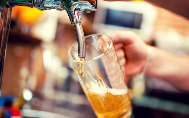 pouring beer from tap