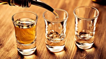 Why Do People Tap Their Shot Glass On The Bar Before Drinking It? Here Are The Leading Theories