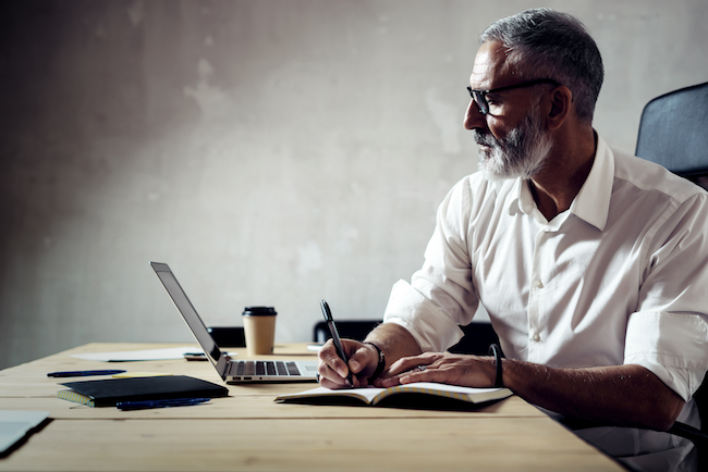 manager looking at computer