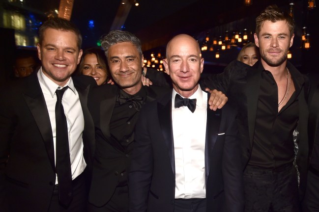 BEVERLY HILLS, CA - JANUARY 07:  (L-R) Matt Damon, Taika Waititi, Amazon Founder/CEO Jeff Bezos, Chris Hemsworth, , and MacKenzie Bezos attend Amazon Studios' Golden Globes Celebration at The Beverly Hilton Hotel on January 7, 2018 in Beverly Hills, California.
