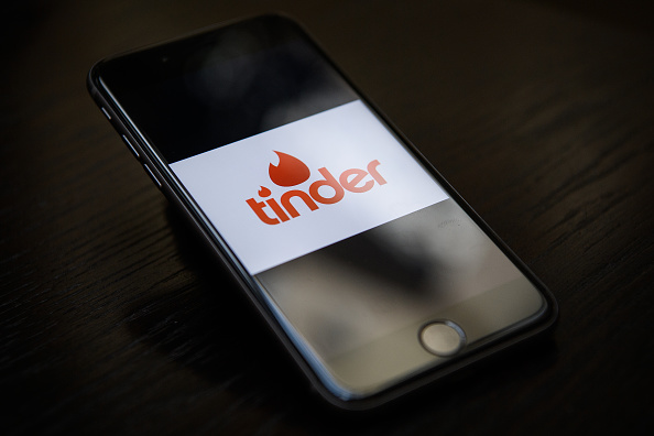 LONDON, ENGLAND - NOVEMBER 24: The "Tinder" app logo is seen on a mobile phone screen on November 24, 2016 in London, England. Following a number of deaths linked to the use of anonymous online dating apps, the police have warned users to be aware of the risks involved, following the growth in the scale of violence and sexual assaults linked to their use. (Photo by Leon Neal/Getty Images)