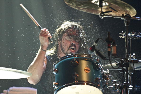 LONDON, UNITED KINGDOM - DECEMBER 17: Dave Grohl of Them Crooked Vultures performs on stage playing drums at Hammersmith Apollo on December 17, 2009 in London, England. (Photo by Neil Lupin/Redferns)