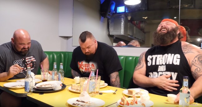 World Strongman winners Eddie The Beast Hall and Brian Shaw went on an airplane and the photo is hilarious, plus do 20,000 calorie cheat day strongman challenge  