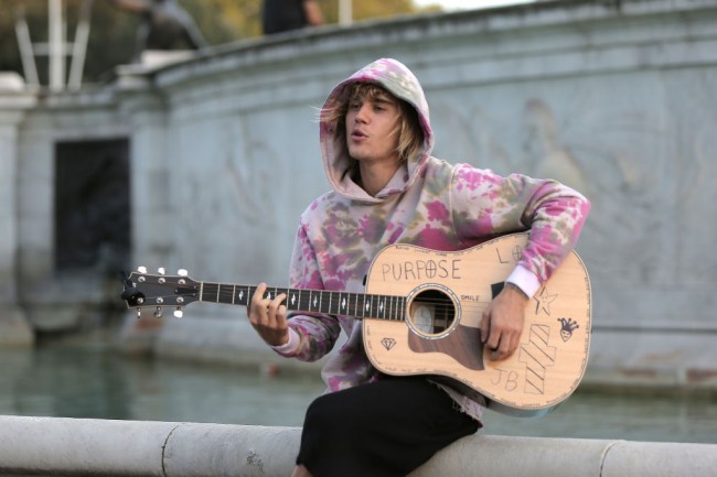 Justin Bieber backtracks on his offer to fight Tom Cruise, says the actor would whoop his ass in a fight.