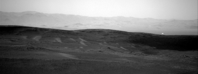 NASA has released a photo taken by its Curiosity rover that shows a mysterious, unexplained white light on Mars.