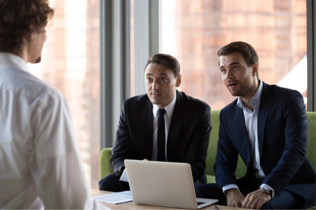 surprised-hr-managers-looking-at-job-candidate-picture-id1092087672