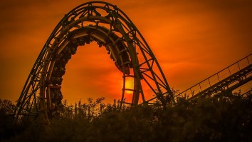 VIDEO: Man Catches Stranger’s Phone Mid-Air On 83-MPH Roller Coaster, Becomes Instant Legend
