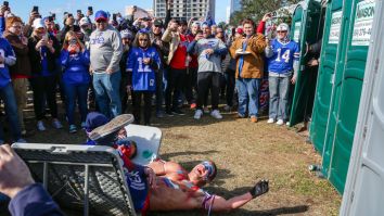 A Member Of Bills Mafia Got Knocked The Hell Out After Trying (And Failing) To Jump Through A Table