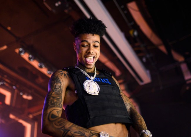 Rapper Blueface criticized for giving money to people on Los Angeles Skid Row on Christmas Eve.