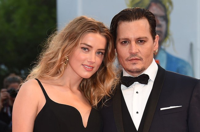 Amber Heard in a swimsuit seen on CCTV with Elon Musk in Johnny Depp's apartment.