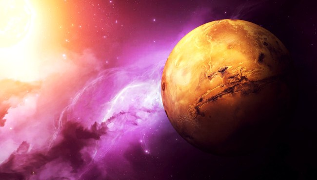 Research Claims Alien Life May Exist Under Ancient Ice Sheets On Mars