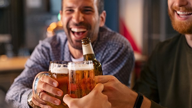 guys drinking at a bar