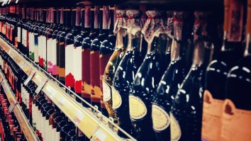 WATCH: Woman Goes On Mad Rampage By Smashing Hundreds Of Liquor Bottles