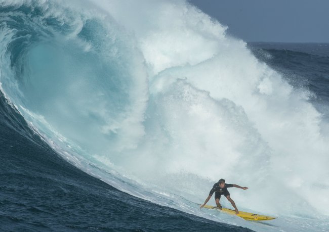 Kai Lenny surfing Jaws