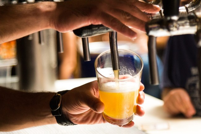 belgian bar owner prison pouring beer