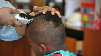 Awesome Photo Of Principal Cutting Student’s Hair Goes Viral For All The Right Reasons