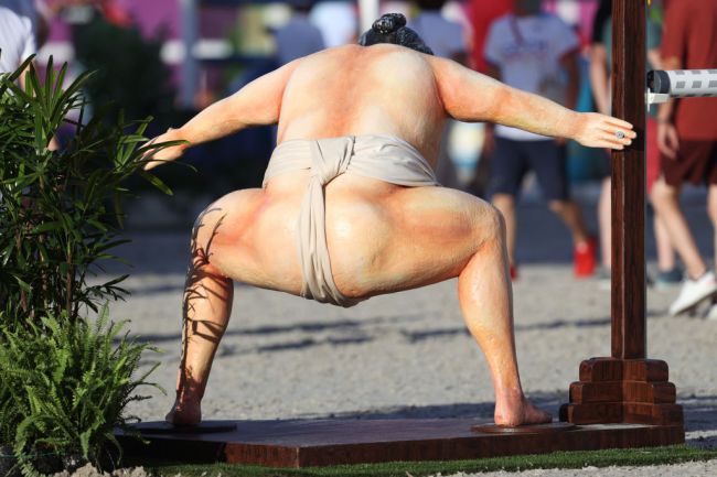 TOKYO, JAPAN - AUGUST 03: A general view of a Sumo wrestler jump is seen during the Jumping Individual Qualifier on day eleven of the Tokyo 2020 Olympic Games at Equestrian Park on August 03, 2021 in Tokyo, Japan.