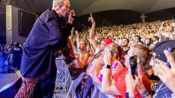 VIDEO: Machine Gun Kelly Booed Loudly At Rock Festival Before Getting In Fight With Audience Member