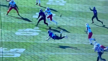 Holy Cross Quarterback Completes Absolutely Insane Underhand Pass While Going Flying (Video)