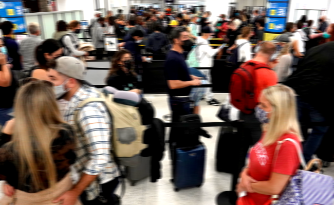 Cop Pulls Gun During Chaotic Brawl At Miami Airport Two People Arrested