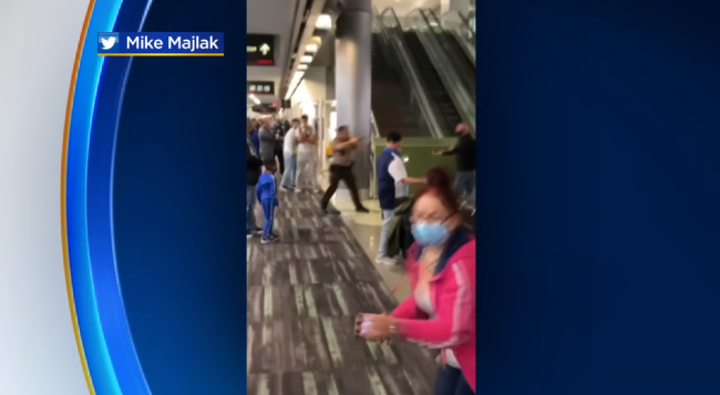 Cop Pulls Gun During Chaotic Brawl Miami Airport Two People Arrested