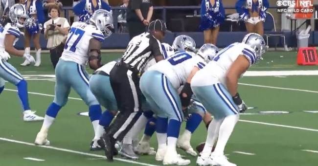 VIDEO: Ref Crashes Into Cowboys' Center While Trying To Spike Ball