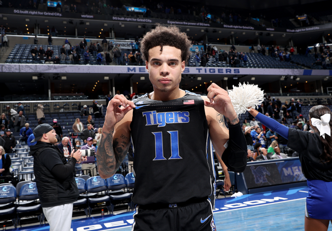 Houston Fan Holds Heinous Sign About Young Dolph At Memphis Game