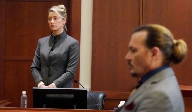 Amber Heard Says She 'Loves' Johnny Depp, Has 'No Ill Will' Towards Him