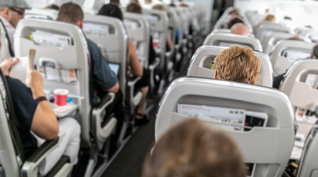 airline passengers in their seats
