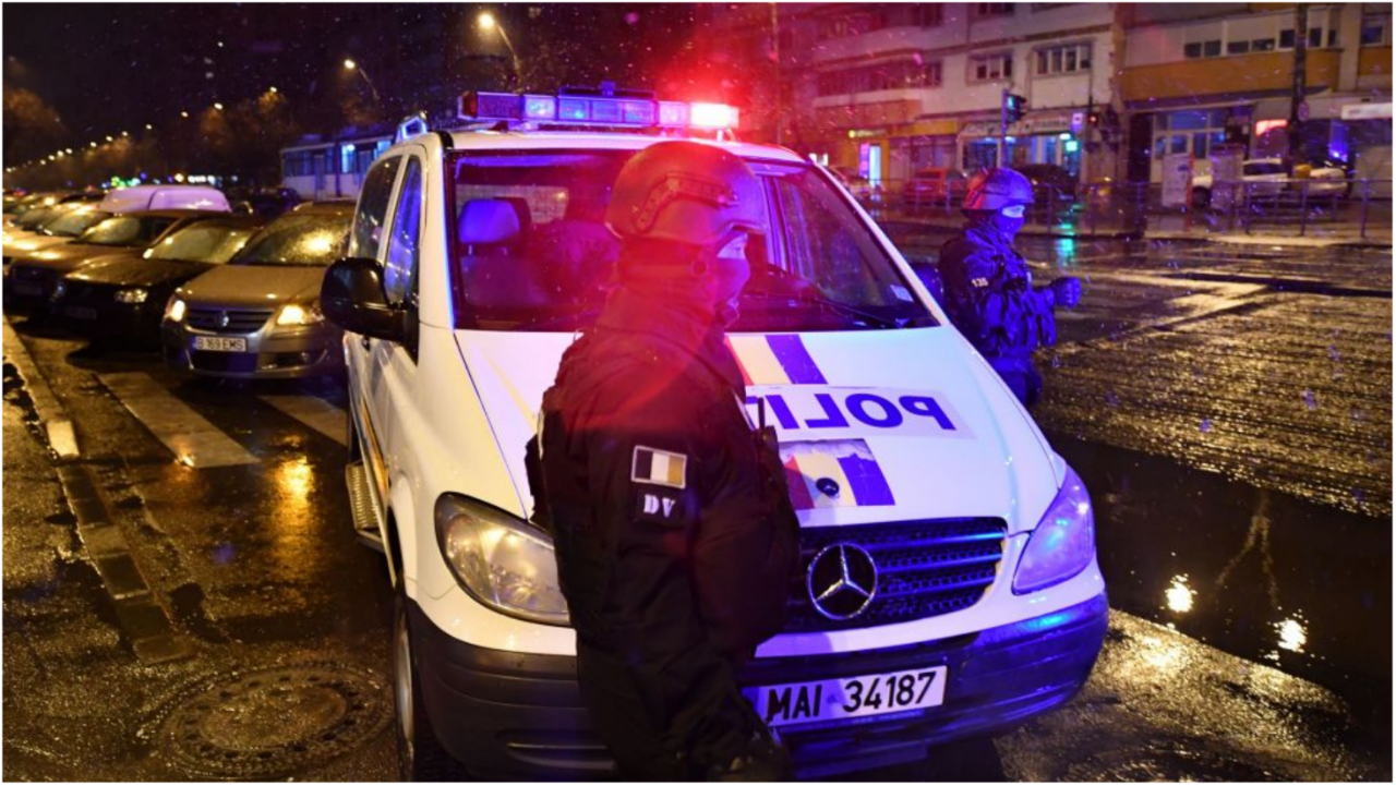 Romanian police arresting someone