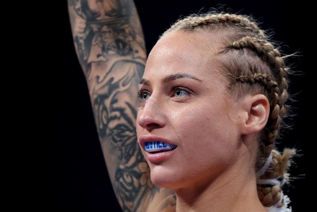 Ebanie Bridges raised arm