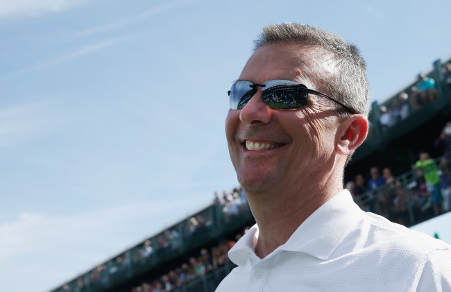 Urban Meyer attends a golf tournament.