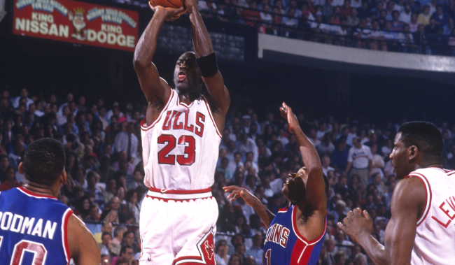 michael jordan shoots over Isiah Thomas