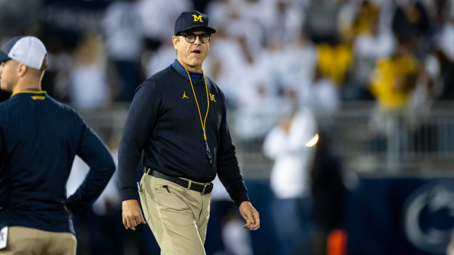 Jim Harbaugh looks on at a Michigan game.
