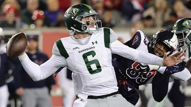 Paxton Lynch throws a pass.