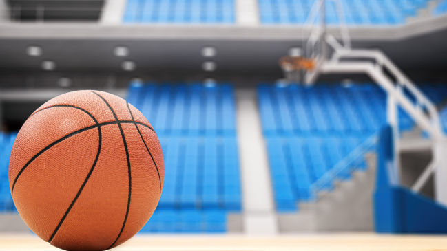 A basketball on the court.