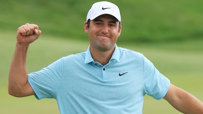 Scottie Scheffler celebrates after winning The Players Championship 