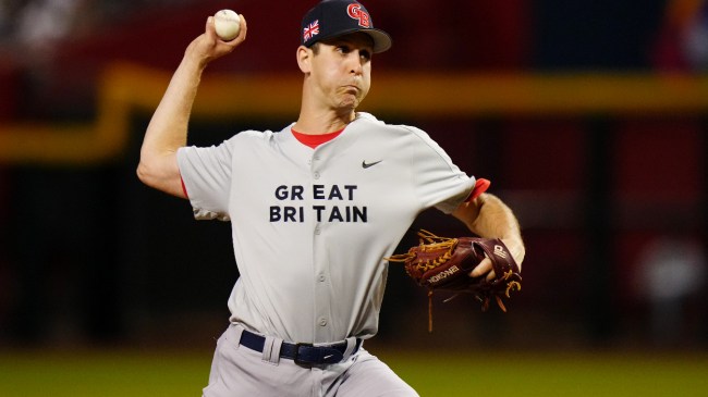 A pitcher winds up for the Great Britain baseball team at the WBC.