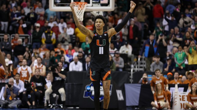 Jordan Miller celebrates Miami's Elite Eight win over Texas.