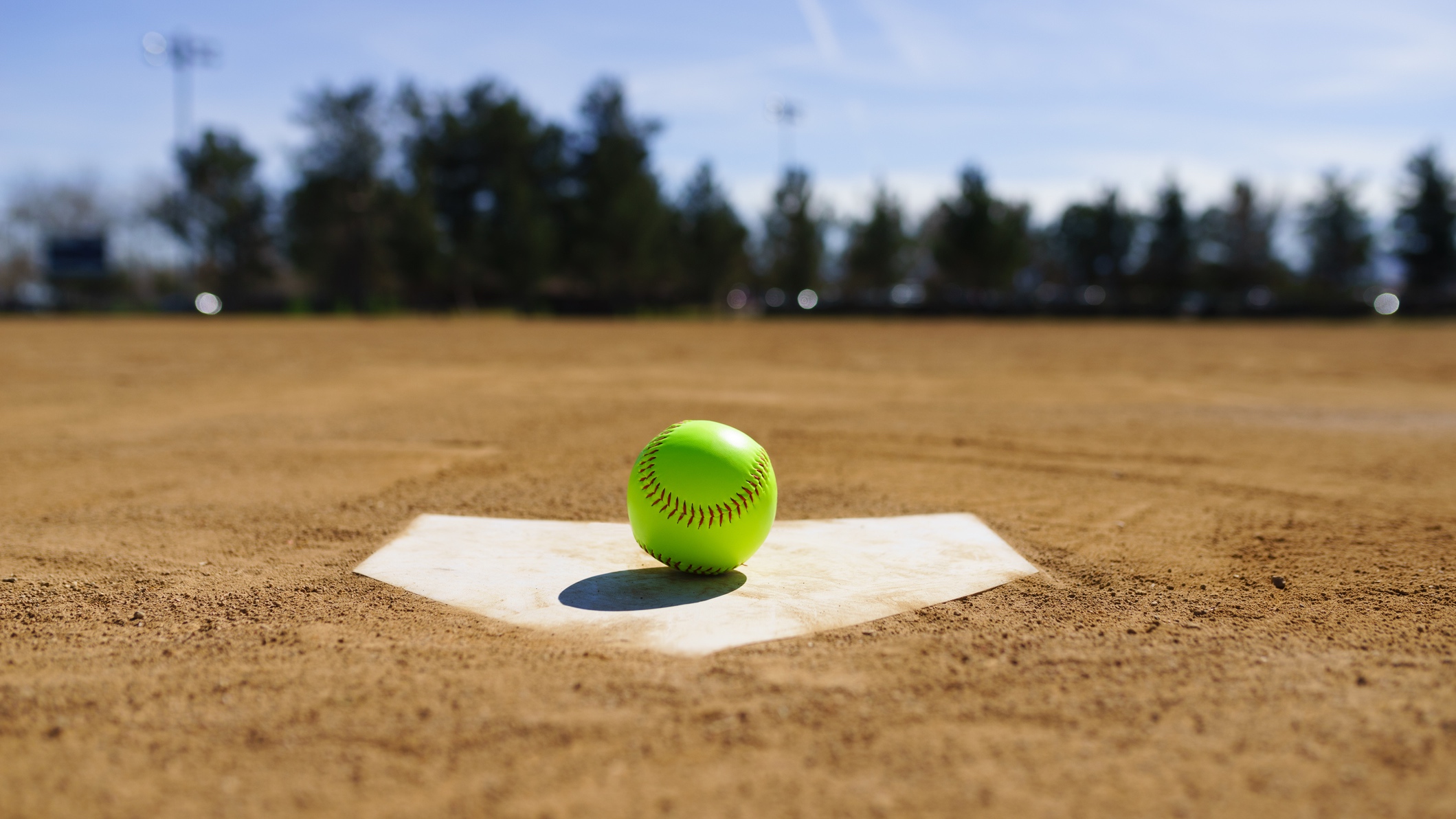 softball play at home plate