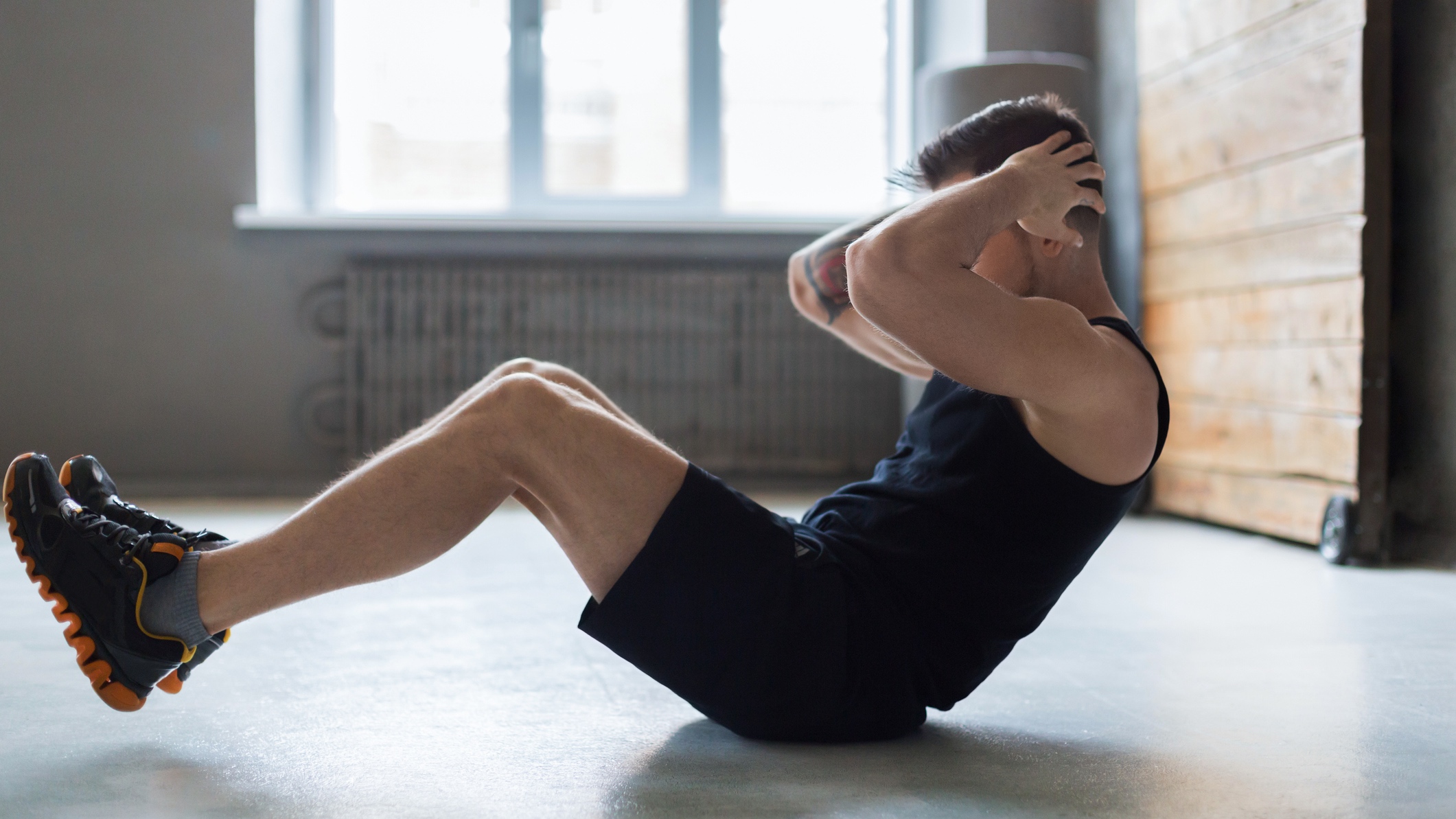 man doing sit-ups