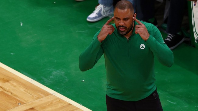 Ime Udoka coaches from the Celtics bench.